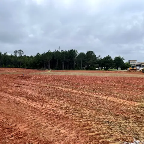 A Bray Siteworks contractor providing precise lot clearing services for a property owner in Watkinsville, creating a stable, clean slate without costly delays.