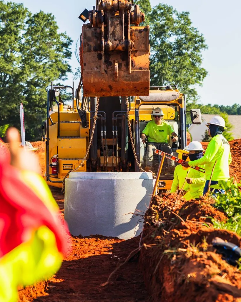 Storm sewer pipe installation on a sitework project in Northeast Georgia